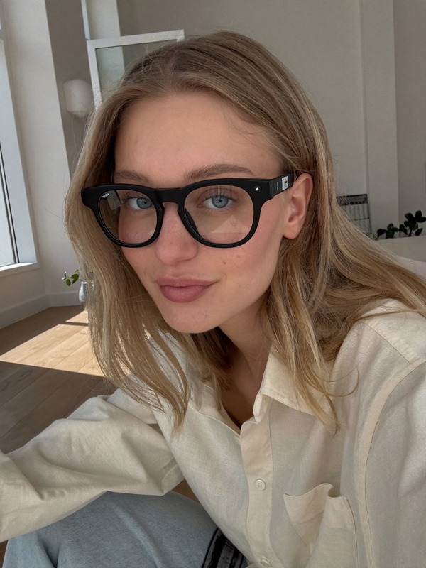 Aira smart glasses worn in minimalist apartment